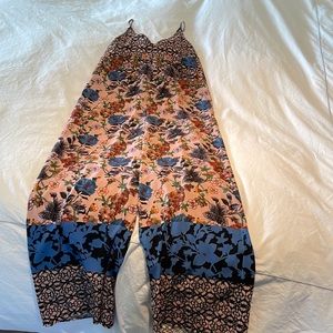 Adorable, multi-colored romper with beautiful patterns